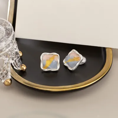 Elegant Glimmer Wave Design Stud Earrings